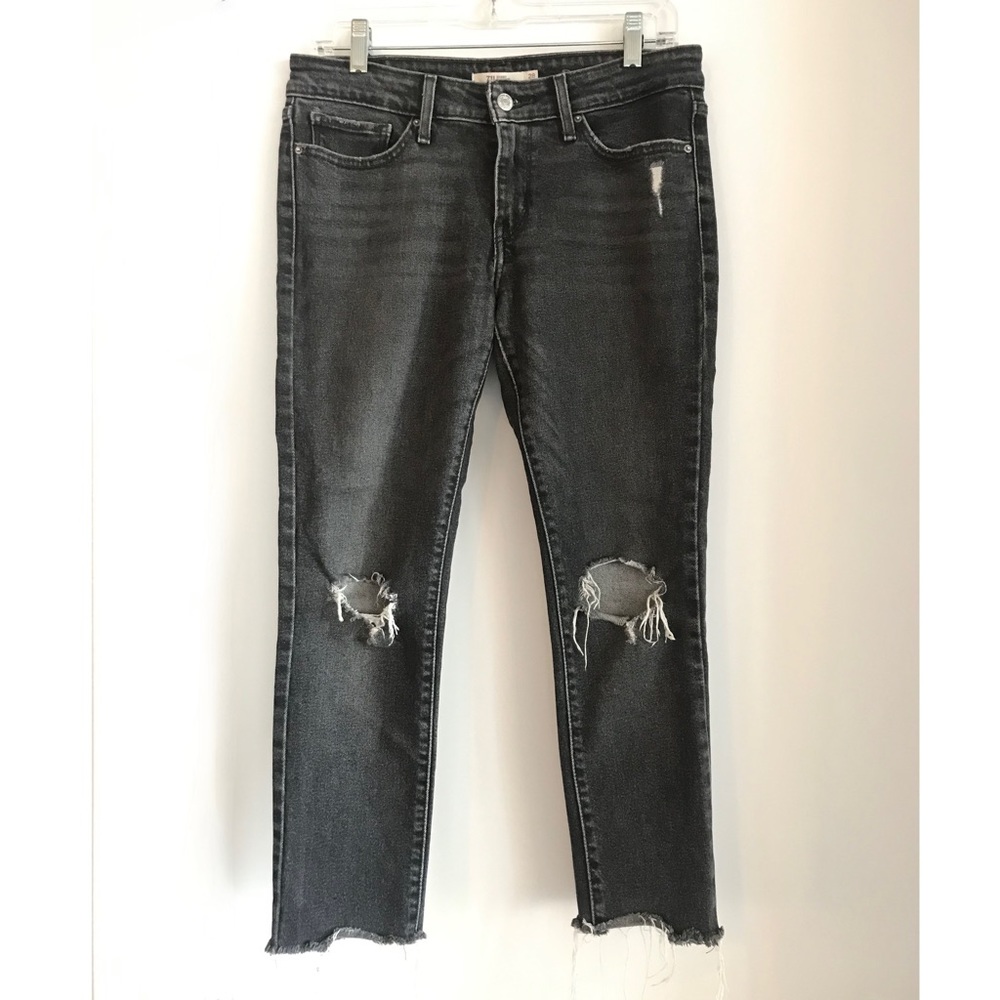 Levi’s 711 faded black skinny jeans